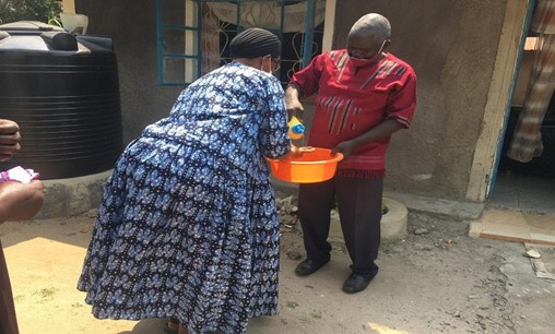 Washing a church members hands