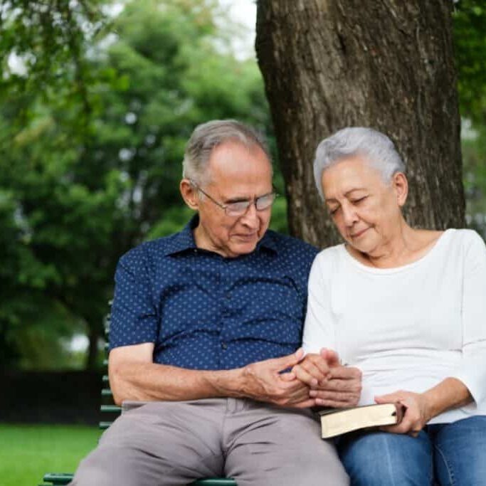 2 older people praying